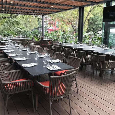 Krystal Grand Suites Insurgentes Ciudad de México Exterior foto The outdoor terrace at the restaurant