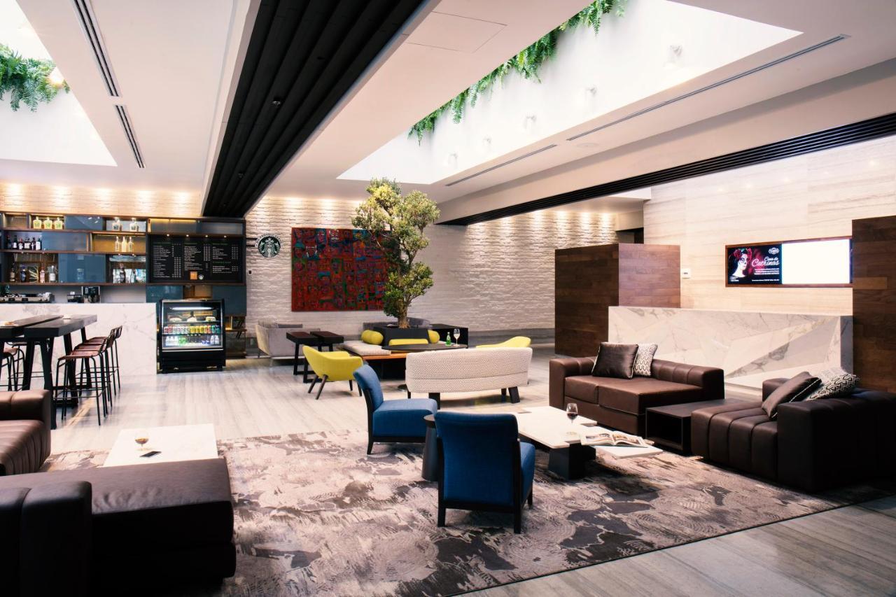 Krystal Grand Suites Insurgentes Ciudad de México Exterior foto The lounge at the airport