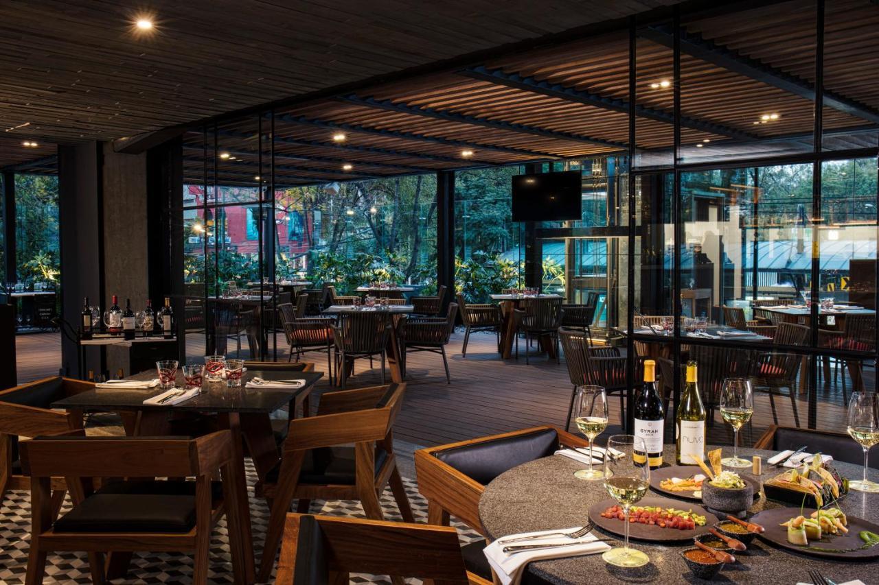 Krystal Grand Suites Insurgentes Ciudad de México Exterior foto The interior of the restaurant