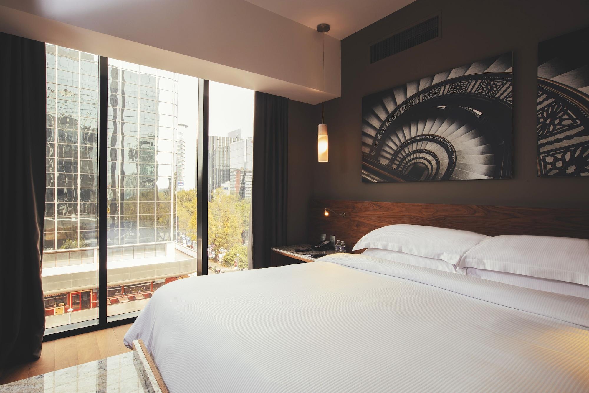 Krystal Grand Suites Insurgentes Ciudad de México Exterior foto A room at the hotel