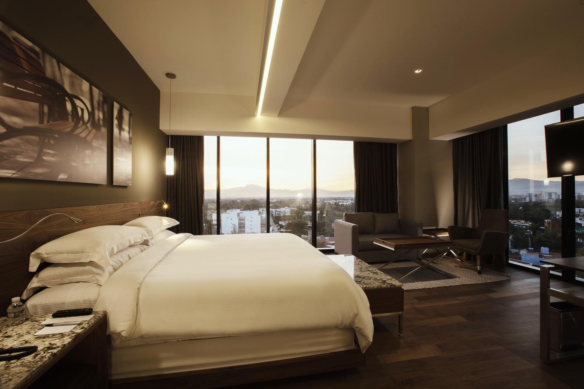 Krystal Grand Suites Insurgentes Ciudad de México Exterior foto A guest room at the hotel