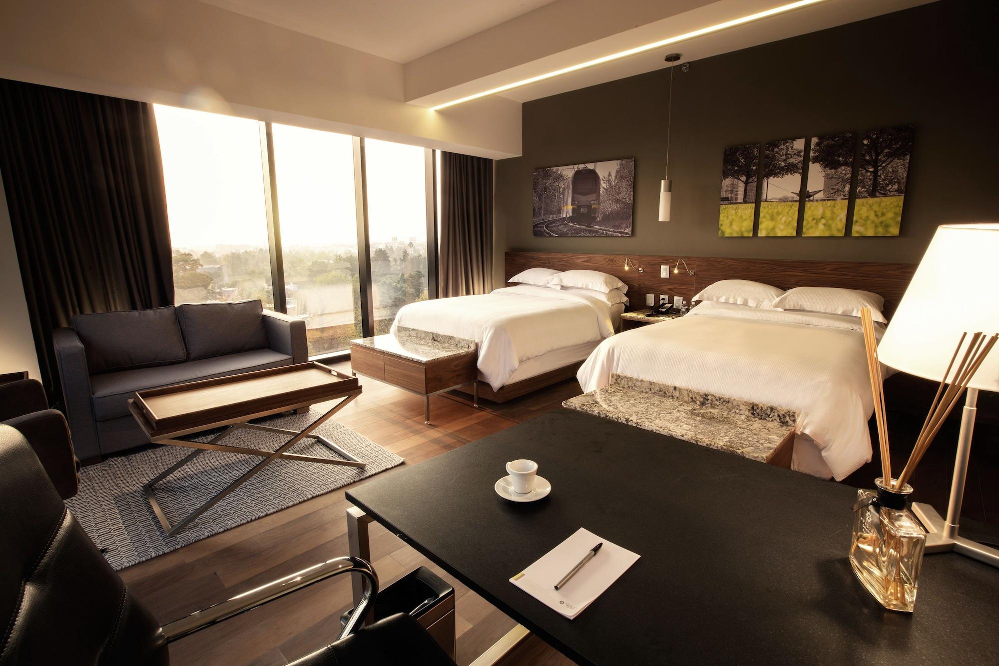 Krystal Grand Suites Insurgentes Ciudad de México Exterior foto A room at the hotel